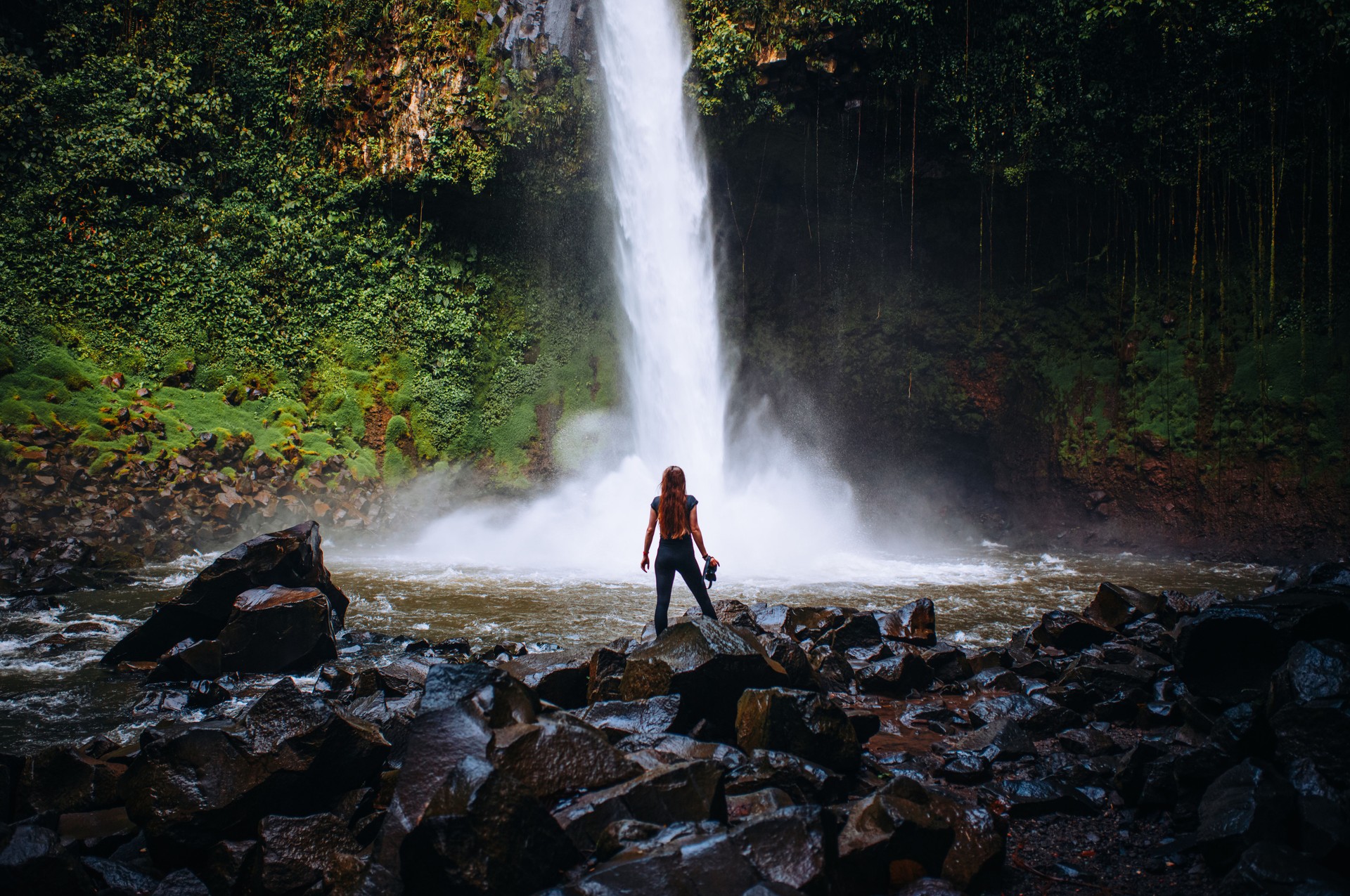 Capturing Nature – Woman at Iconic La Fortuna Falls on Costa Rica Journey